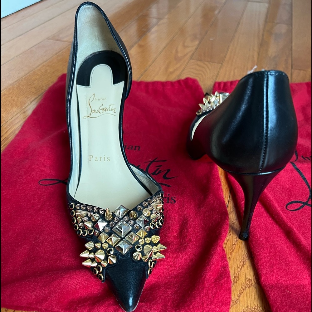 Stiletto pointed toe pumps, leather with gold, silver studs. Gorgeous shoe